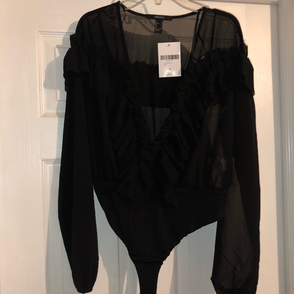 Black ruffle bodysuit. Size small. New with tags!